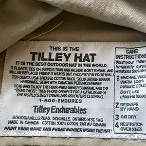Tiley hat size 71/8 with lots of different styles to create color, beige